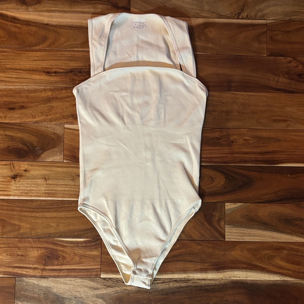 Elegant Cream Ribbed Bodysuit